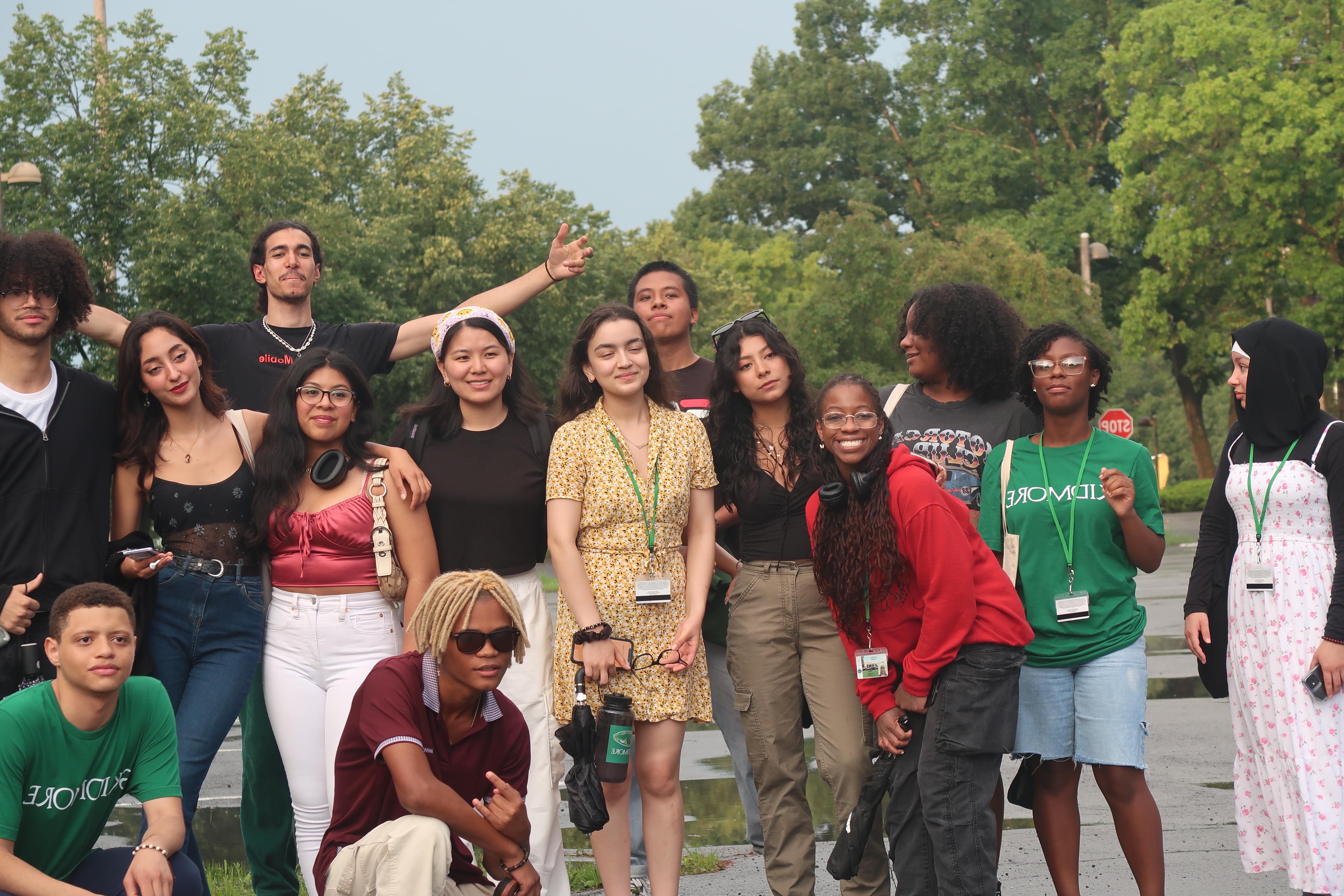 14 Students posing for the camera outside